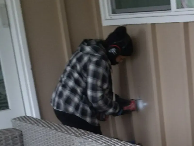 Professional electrician installing an exterior outlet in Chico
