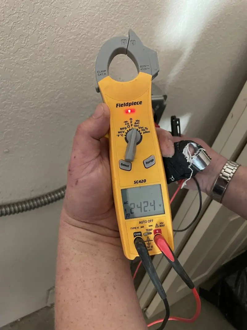 Voltage testing with clamp meter during Electrical Installation Services in Chico